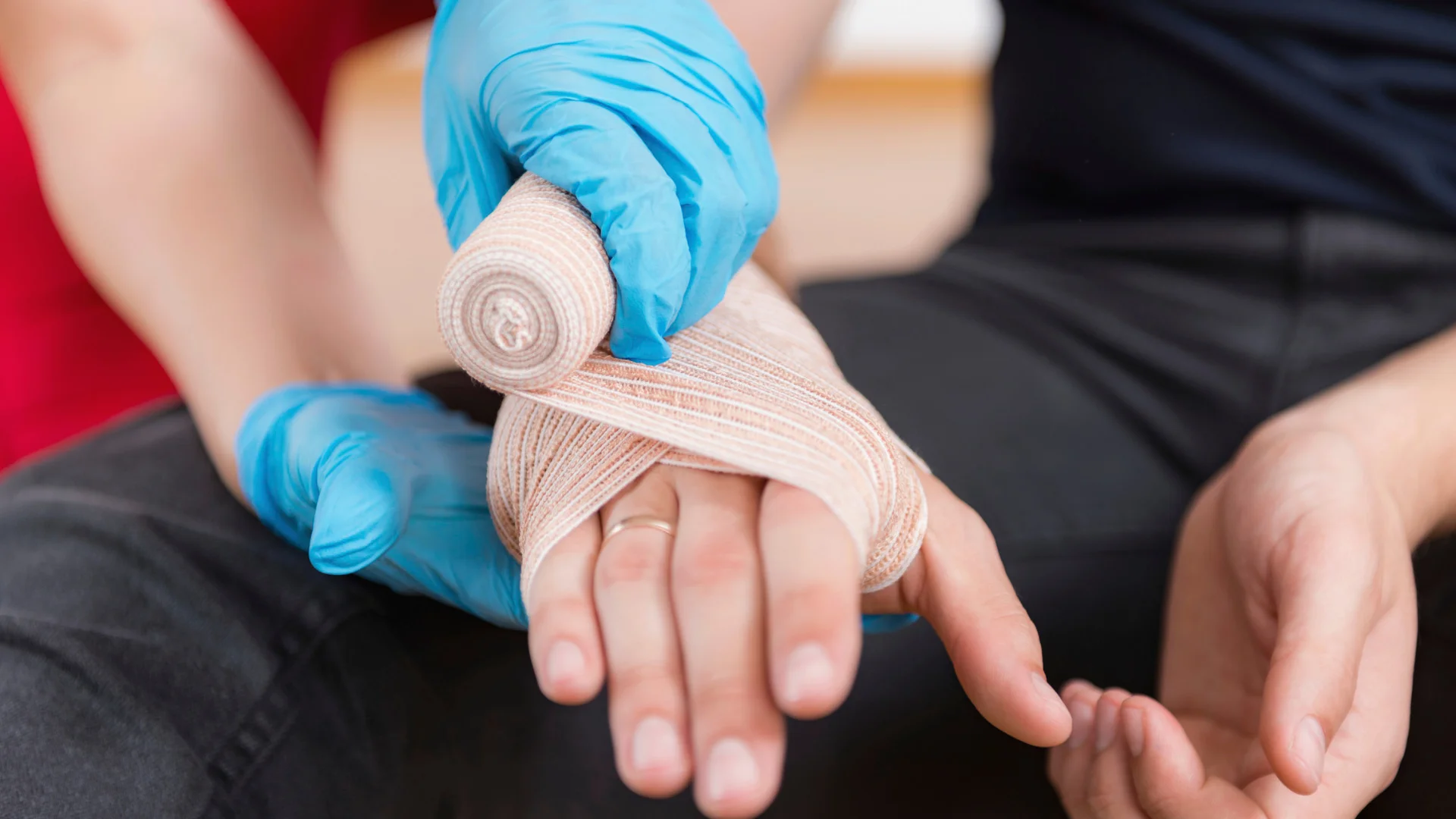 World First Aid Day 2023 - bandage hand bandage hand